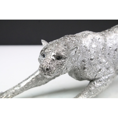 323 - The Leonardo Collection silver art - stalking cheetah statue figurine with gem eyes, 39cm