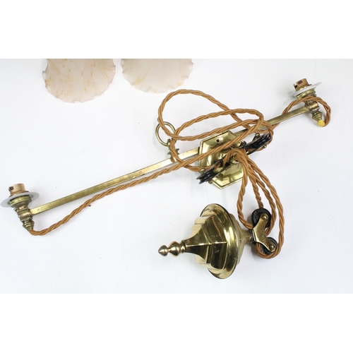 331 - 20th century brass hanging light fitting with two glass shades on pully style system