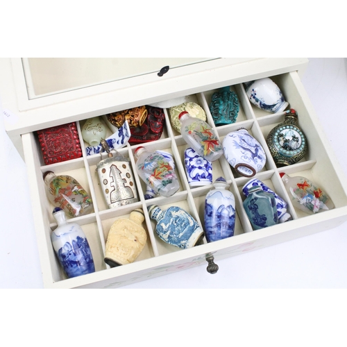 338 - Cased collection of twenty two Oriental scent bottles to include blue and white, glass and carved ex... 