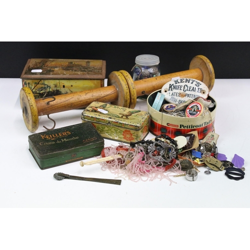 344 - Basket of sewing related paraphernalia to include large sewing bobbin with hooks, fringing, beading,... 