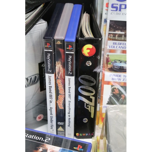 352 - Box of 007 James Bond commemorative and collectors items to include DVD's, Playstation games, Cd, bo... 