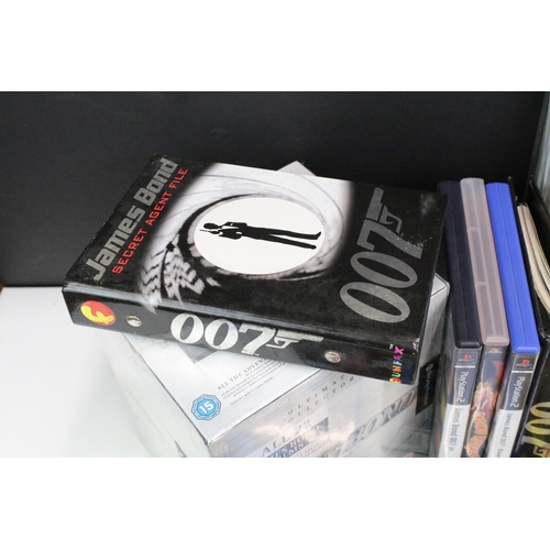 352 - Box of 007 James Bond commemorative and collectors items to include DVD's, Playstation games, Cd, bo... 