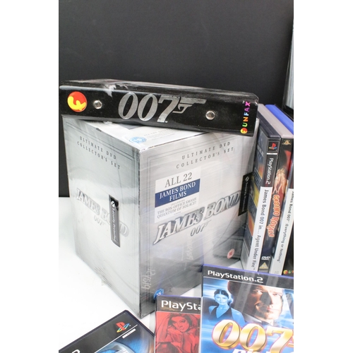 352 - Box of 007 James Bond commemorative and collectors items to include DVD's, Playstation games, Cd, bo... 