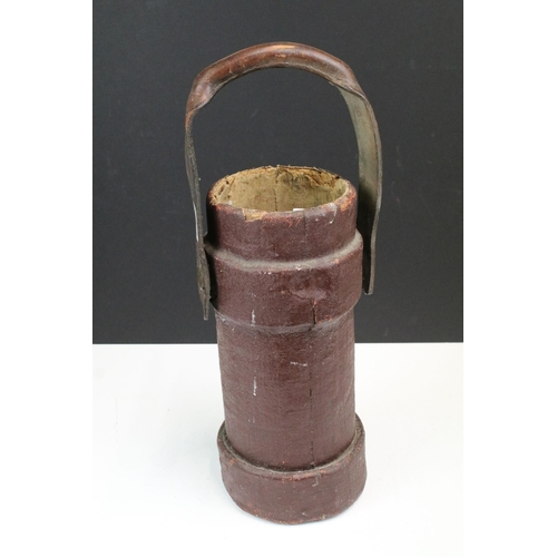 171A - First World War artillery shell carrier of canvas construction with leather carry handle and coat of... 