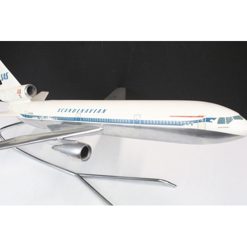 223A - Two SAS Scandinavian Airways desktop aircraft models to include a DC-9 and a DC-10 example.