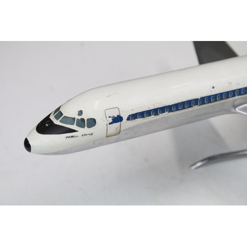 223A - Two SAS Scandinavian Airways desktop aircraft models to include a DC-9 and a DC-10 example.