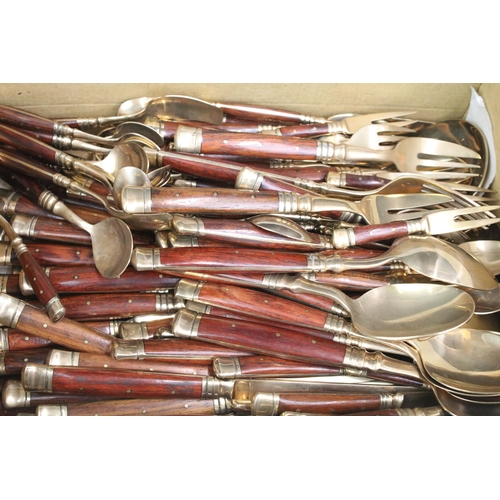 356 - Assortment of wooden handled gold metal cutlery