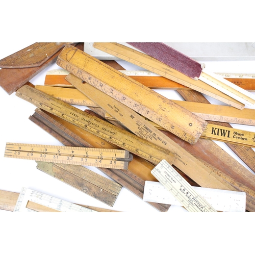 369 - Collection of antique and vintage rulers, set squares and measuring implements to include grand clot... 