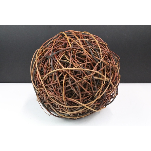 382 - Decorative wicker ball of woven form. Measures 28cm diameter.