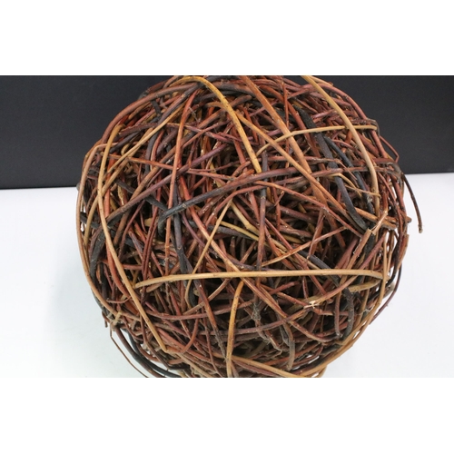 382 - Decorative wicker ball of woven form. Measures 28cm diameter.