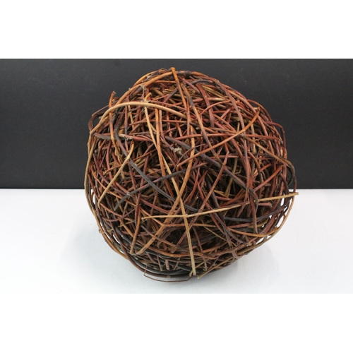 382 - Decorative wicker ball of woven form. Measures 28cm diameter.