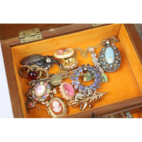 259 - A large collection of mainly contemporary costume jewellery to include earrings, bangles, braclets, ... 