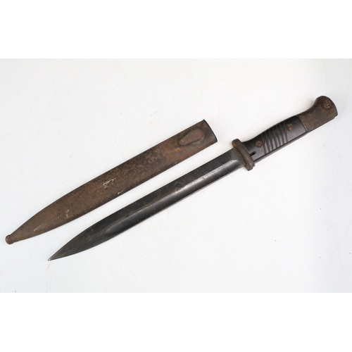 262 - A World War Two era German K98 Bayonet, maker marked Elite Diamant and together with metal scabbard.