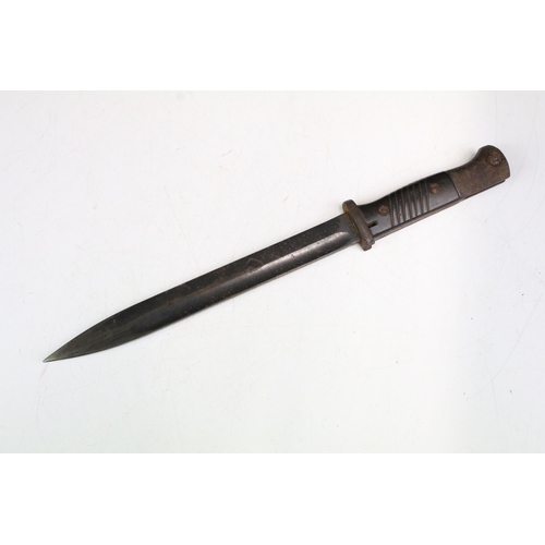 262 - A World War Two era German K98 Bayonet, maker marked Elite Diamant and together with metal scabbard.