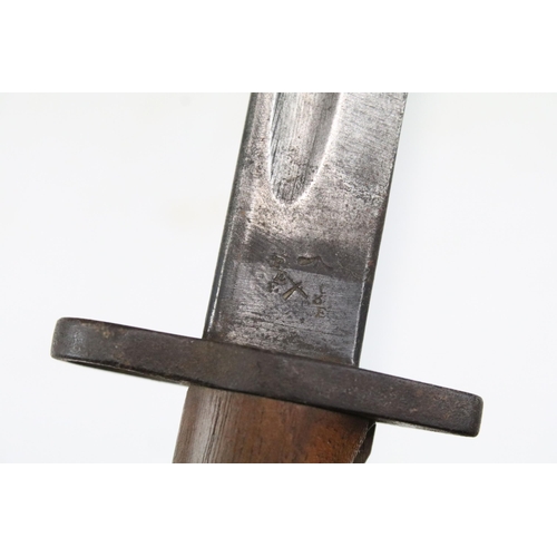 266 - A British World War One 1907 pattern Wilkinson bayonet complete with leather scabbard.