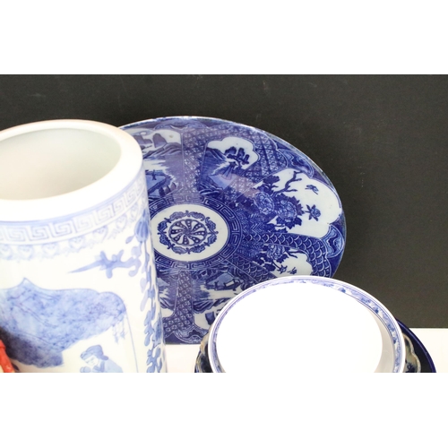 104 - Large collection of Oriental chinaware to include donut teapots, large selection of blue and white p... 