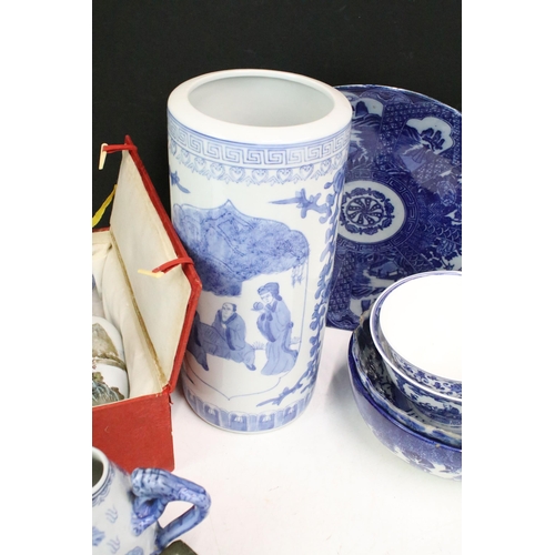 104 - Large collection of Oriental chinaware to include donut teapots, large selection of blue and white p... 