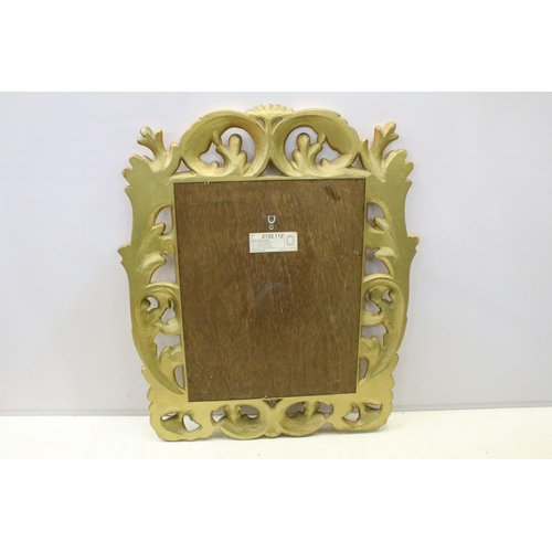 159 - Large decorative carved and gilded wall mirror, H 74cm, W 62cm