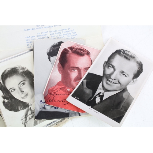 276 - A small collection of film star and royalty postcards to include a Bing Crosby example with covering... 