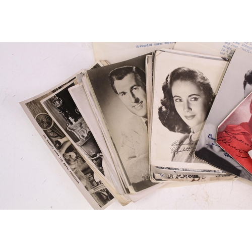 276 - A small collection of film star and royalty postcards to include a Bing Crosby example with covering... 