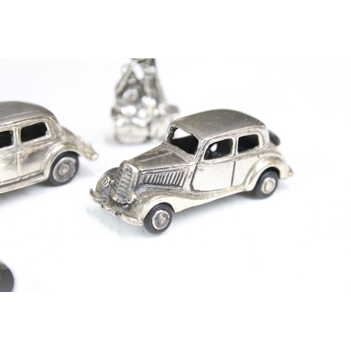 277 - A small group of mainly silver plated miniature collectables to include cars, figures and two baby t... 