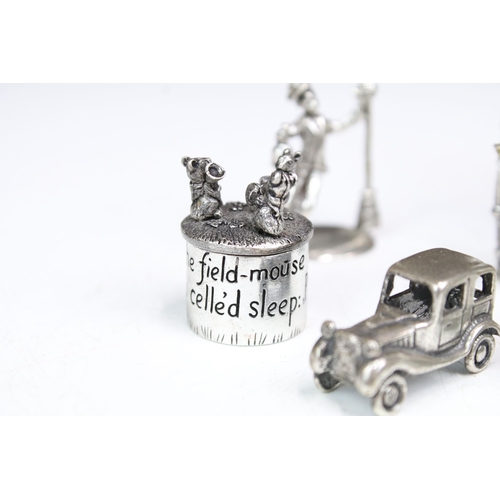 277 - A small group of mainly silver plated miniature collectables to include cars, figures and two baby t... 