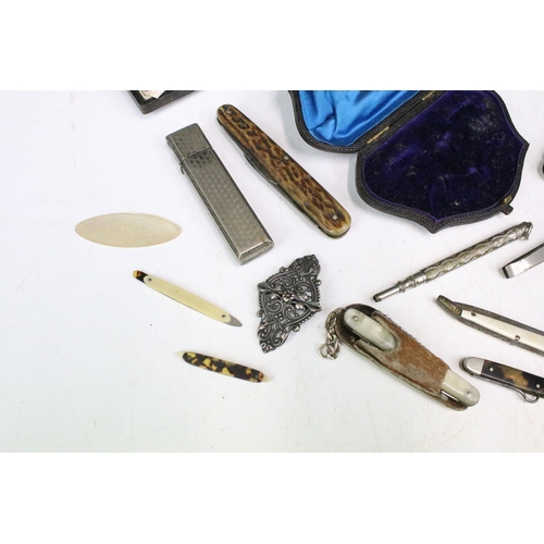 288 - A group of mixed collectables to include pocket lighters, pocket knives and fruit knives, jewellery ... 