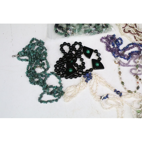 292 - A collection of gemstone and pearl necklaces to include amethyst and malachite examples.