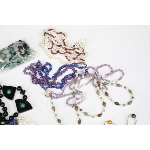 292 - A collection of gemstone and pearl necklaces to include amethyst and malachite examples.