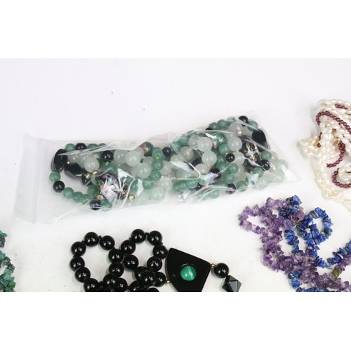 292 - A collection of gemstone and pearl necklaces to include amethyst and malachite examples.