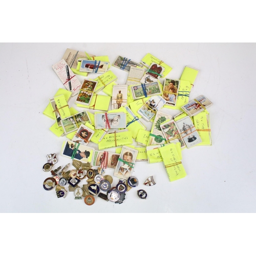 293 - A small collection of mixed cigarette cards together with a collection of football related enamel ba... 