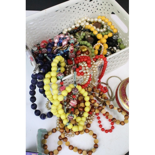 299 - A collection of vintage and contemporary costume jewellery to include beaded necklaces, earrings, br... 