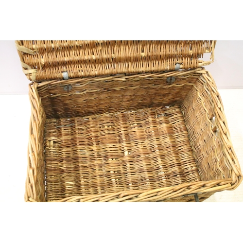 656 - Early 20th century wicker hamper with iron mounts and closing mechanism, H 33cm W 64cm