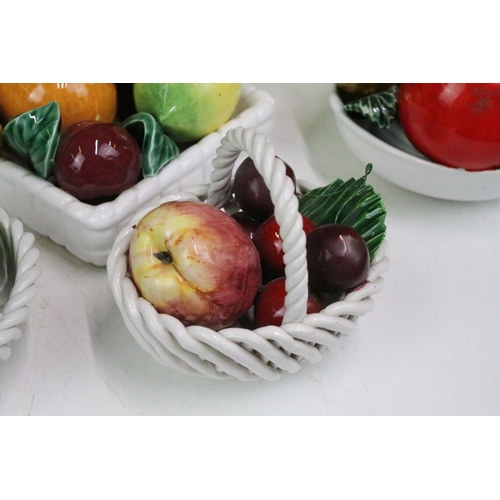 87 - Selection of ten fruit inspired ceramics to include a footed fruit basket display by All Art Trad Co... 