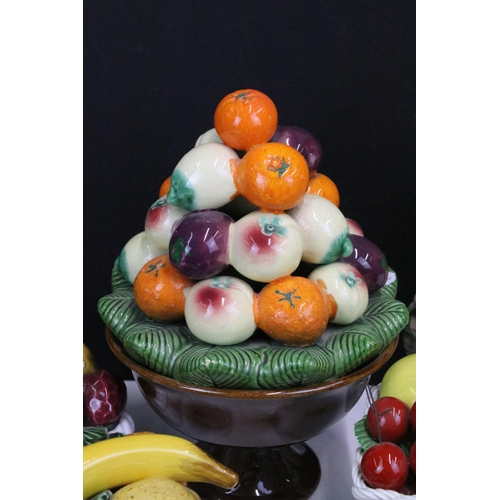 87 - Selection of ten fruit inspired ceramics to include a footed fruit basket display by All Art Trad Co... 