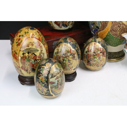 88 - Selection of Oriental pieces to include assortment of ornate hand painted ceramic eggs in varying si... 