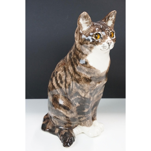 11 - Large Winstanley pottery model of a tabby cat with glass eyes, H 34cm, hand signed and marked Englan... 