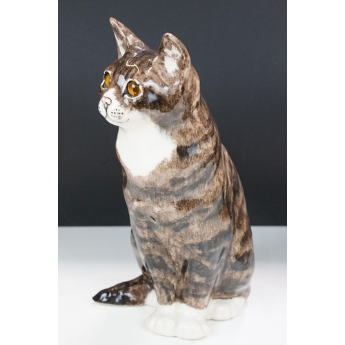 11 - Large Winstanley pottery model of a tabby cat with glass eyes, H 34cm, hand signed and marked Englan... 