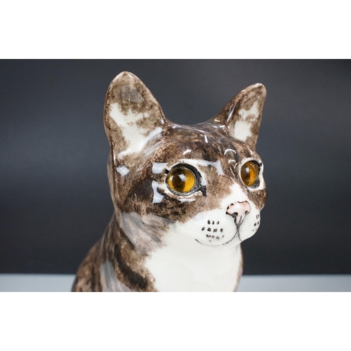 11 - Large Winstanley pottery model of a tabby cat with glass eyes, H 34cm, hand signed and marked Englan... 