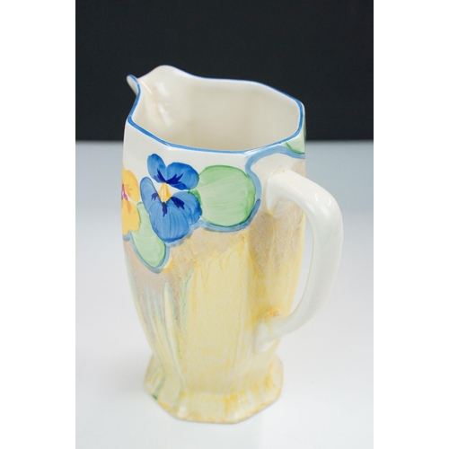 17 - Bizarre by Clarice Cliff hand painted 'Pansies' jug, H 16cm together with an Art Deco sugar sifter H... 