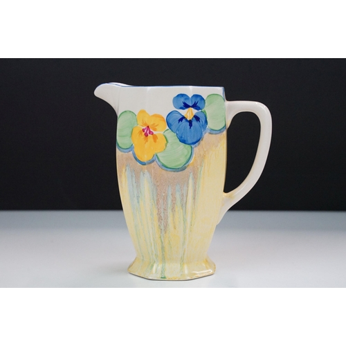 17 - Bizarre by Clarice Cliff hand painted 'Pansies' jug, H 16cm together with an Art Deco sugar sifter H... 