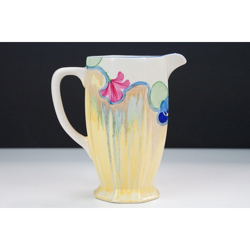 17 - Bizarre by Clarice Cliff hand painted 'Pansies' jug, H 16cm together with an Art Deco sugar sifter H... 