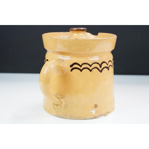 29 - Slipware lidded stoneware pottery beer jug pitcher, with decorative border H 16.5cm