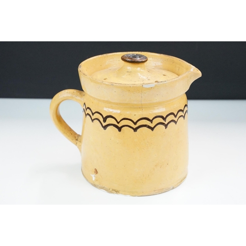 29 - Slipware lidded stoneware pottery beer jug pitcher, with decorative border H 16.5cm