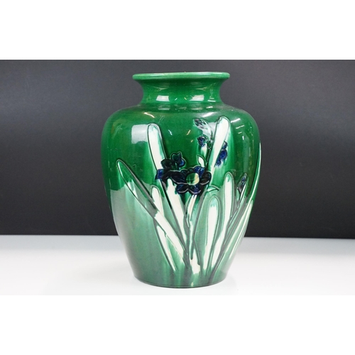 32 - Large green glaze vase with blue flower detail decoration, H 30cm