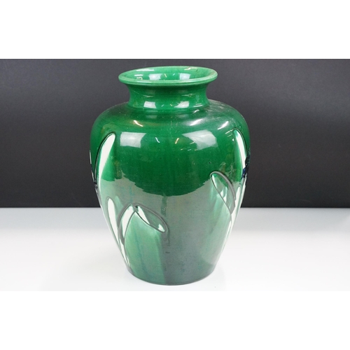 32 - Large green glaze vase with blue flower detail decoration, H 30cm