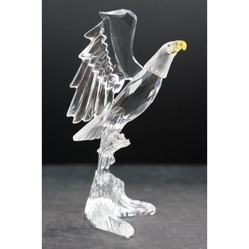 34 - Collection of five Swarovski crystal figurines to include a Pegasus, eagle, horse standing, horse re... 