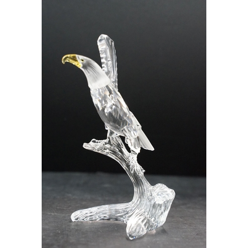 34 - Collection of five Swarovski crystal figurines to include a Pegasus, eagle, horse standing, horse re... 