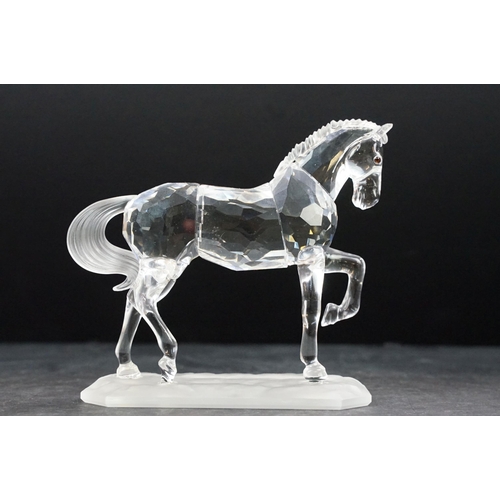 34 - Collection of five Swarovski crystal figurines to include a Pegasus, eagle, horse standing, horse re... 