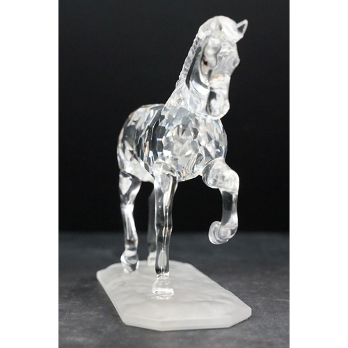 34 - Collection of five Swarovski crystal figurines to include a Pegasus, eagle, horse standing, horse re... 